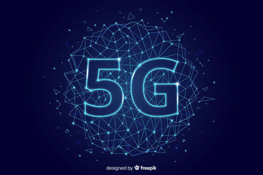 A graphic representation of a 5G signal tower and a mobile phone and laptop in the foreground.